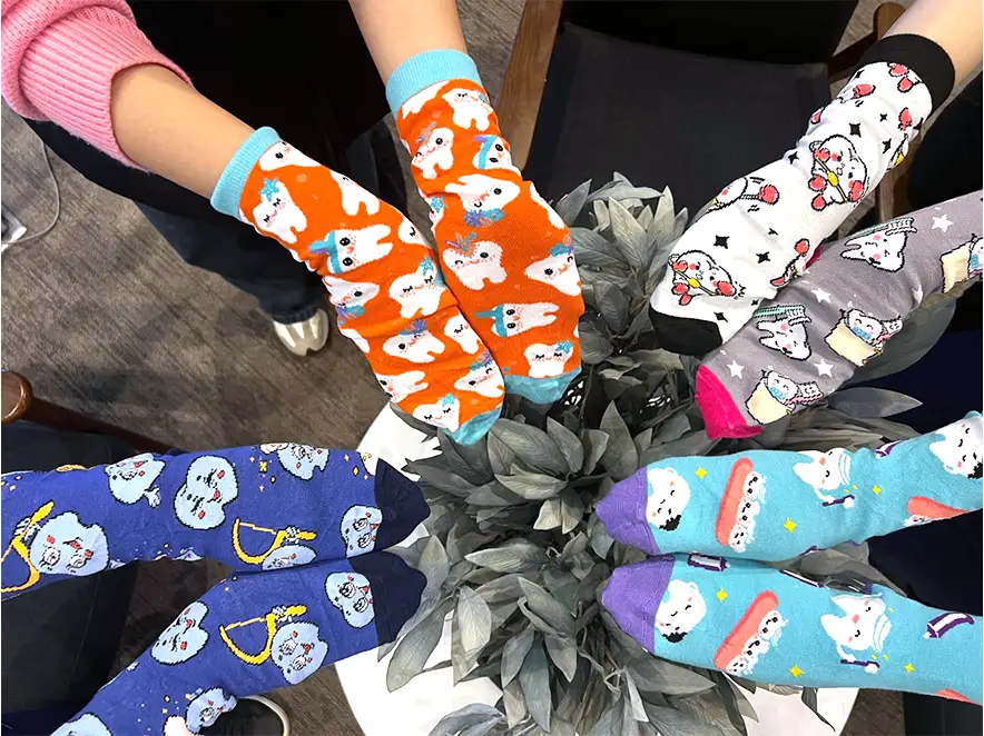 MC Dental Supports Crazy Socks 4 Docs Day
