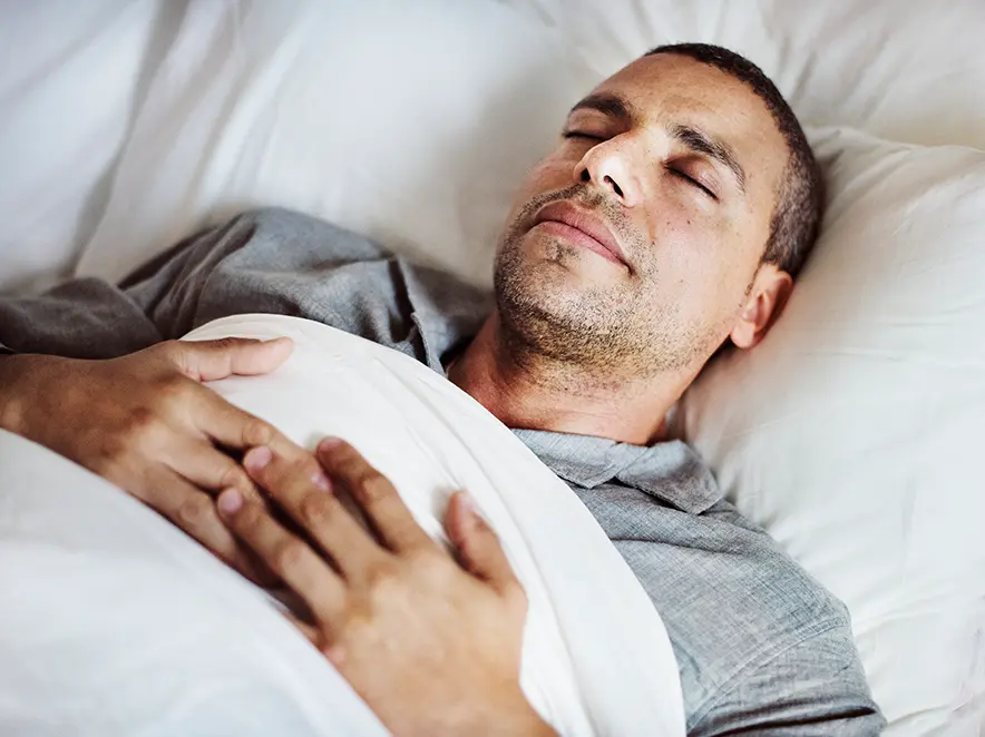 sleeping man apnoea treatment