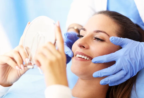 happy dental patient in chair