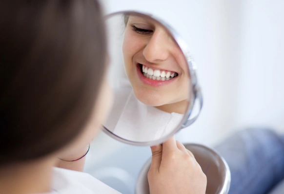 check teeth in the mirror